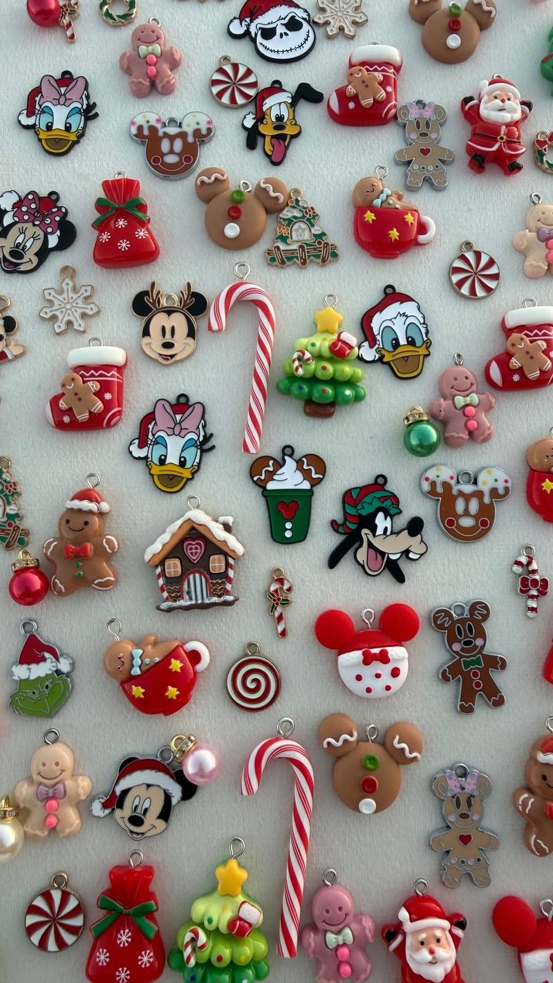 A colorful spread of charms including gingerbread men, candy canes and stockings